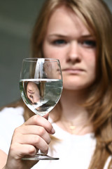 Girl with a glass of water