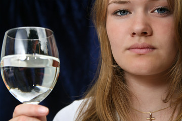Girl with a glass of water