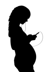 Pregnant woman listening to music