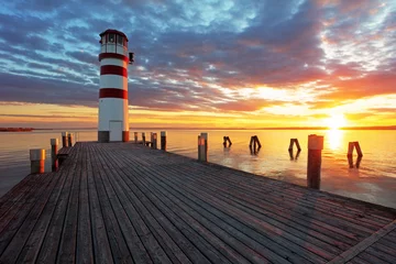 Türaufkleber Küste Lighthouse at Lake Neusiedl at sunset