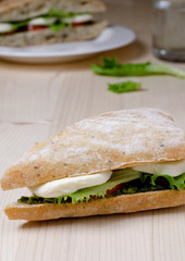 Sandwich with mozzarella, tomatoes and pesto