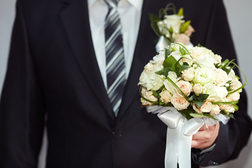 Groom with a bouquet