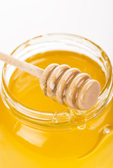 Honey in bank isolated by the white