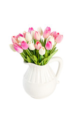 white tulips in a vase on a white background.