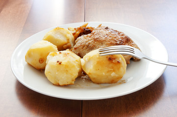 Roast chicken with potatoes