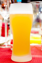Glass of fresh beer closeup