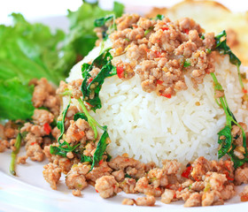 Fried pork with sweet basil and fried egg, Thai spicy food
