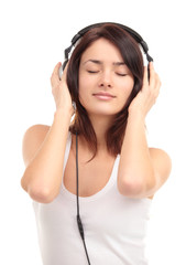 Naklejka premium Woman with headphones listening music on player