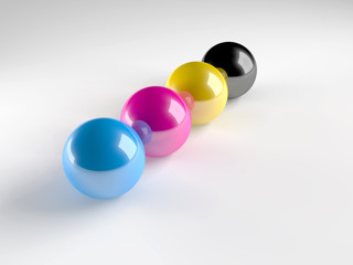 Four colored balls for CMYK printing process