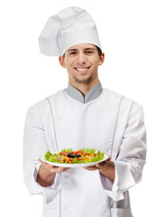 Portrait of cook with salad dish, isolated on white