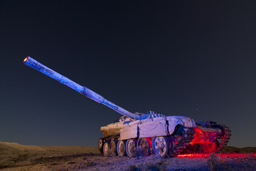 Abandoned Tank in the desert at night