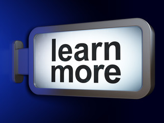 Education concept: Learn More on billboard background