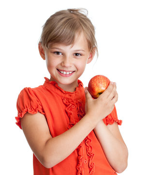 girl eating red apple isolated