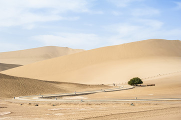 A winding path in the desert, Dunhuang, China