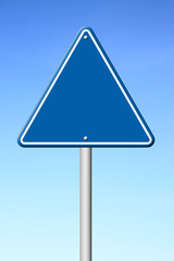 triangular road sign with sky