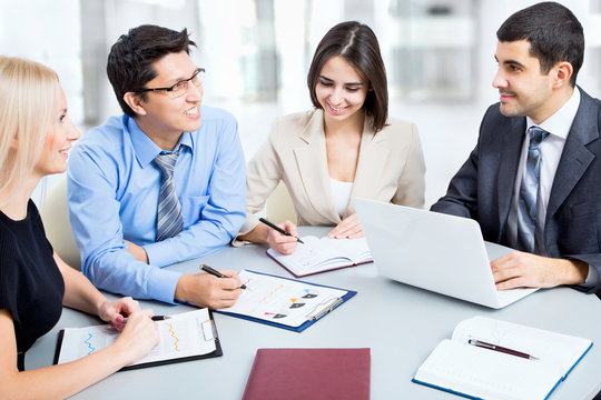 Business people working at meeting