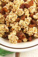 Crunchy oat clusters with raisins closeup