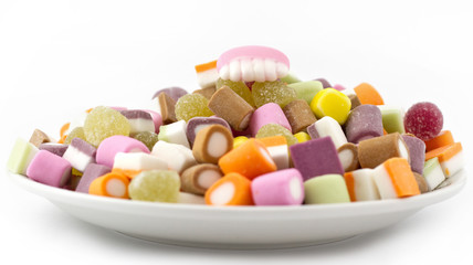 Plate of mixed sweets with teeth