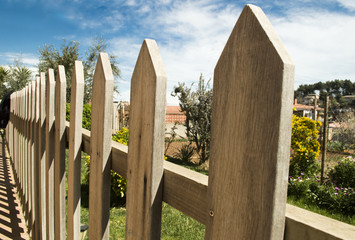 wooden fence and blue sky background