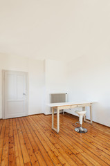 home interior,.view.table in a room with white walls