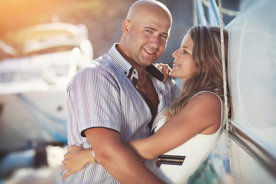 Couple in love on dating near sea at honeymoon