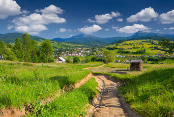 Plakat Beautiful summer landscape in the mountains village