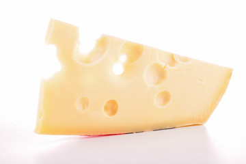 isolated slice of gruyere