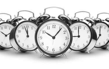 alarm clocks on white background