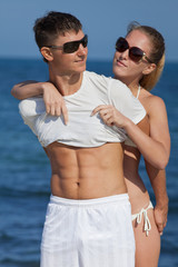 Attractive couple at the sea