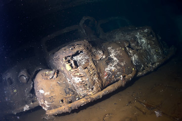 Old Car inside II world war ship wreck hold