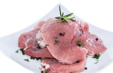 Raw Schnitzel on a plate (white)