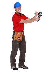 Man holding angle grinder
