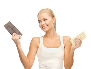 smiling woman with dark and white chocolates