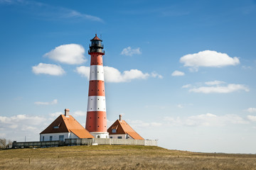 Fototapeta na wymiar Lighthouse Westerhever on sunny day