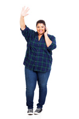 plus size teenage girl using cell phone and waving hand