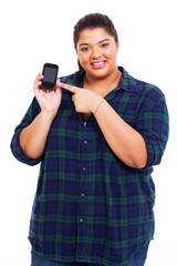 young overweight woman showing smart phone