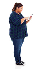 plus size teenage girl chatting with tablet computer