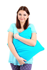Fototapeta premium Beautiful young girl with pillow isolated on white.