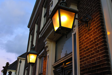 Lanterns on facade of the house in Dutch town Loenen . Netherlan