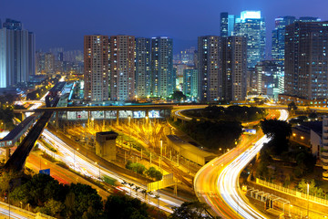 Fototapeta na wymiar highway and city at night