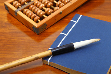 chinese book and abacus