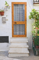 Fototapeta na wymiar Drewniane drzwi. Castellaneta. Puglia. Włochy.