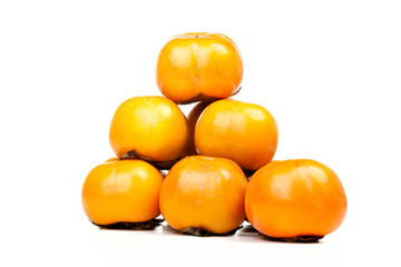 Persimmons in heap