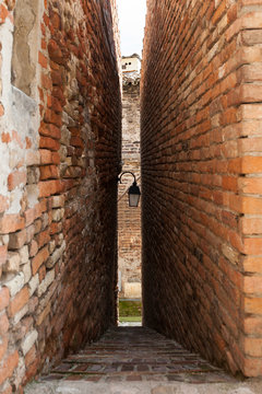 Smallest alley in Italy (43 cm) in Ripatransone. Marche, Italy.