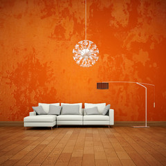 Sofa vor orangener Wand