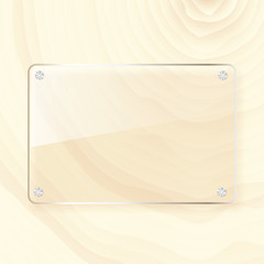 rectangular glass plate on wood background