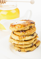 Delightful cheese pancakes on the white