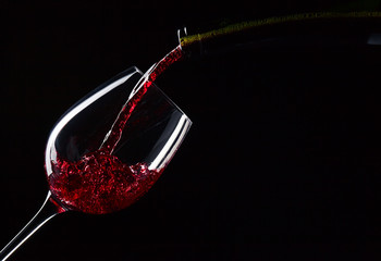 bottle and glass with red wine © Igor Normann