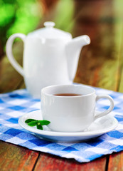 Cup of tea on wooden table