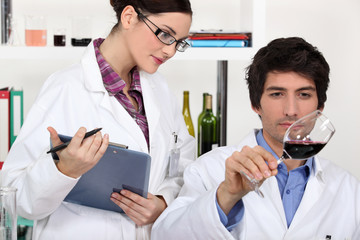 Testing wine in a laboratory